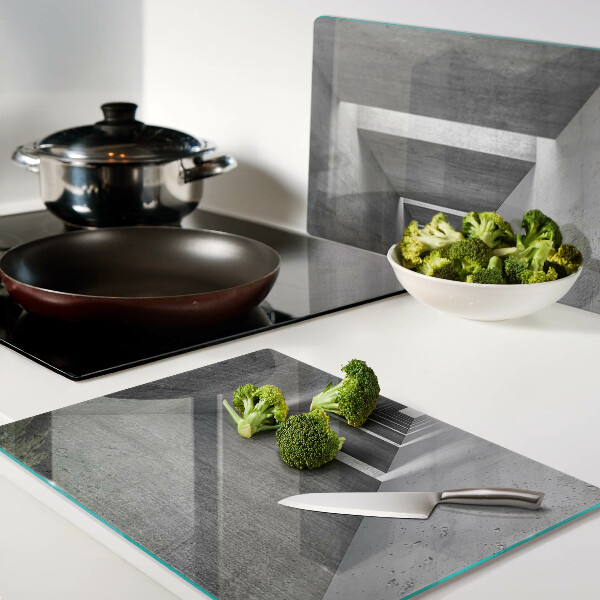 Tagliere in vetro con motivo a tunnel architettonico nei toni del grigio