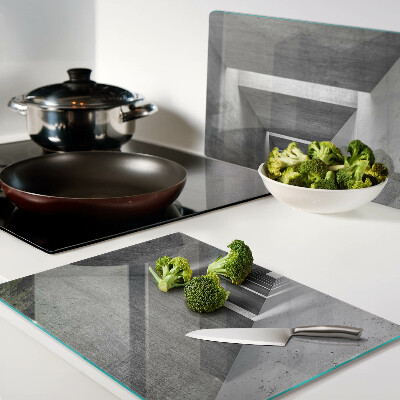 Tagliere in vetro con motivo a tunnel architettonico nei toni del grigio