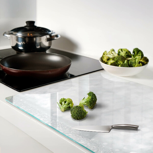 Tagliere in vetro temperato con motivo bokeh scintillante ed effetto luci