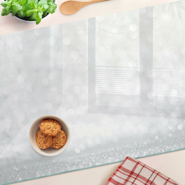 Tagliere in vetro temperato con motivo bokeh scintillante ed effetto luci