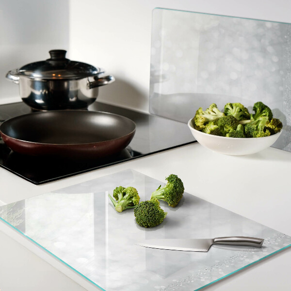 Tagliere in vetro temperato con motivo bokeh scintillante ed effetto luci