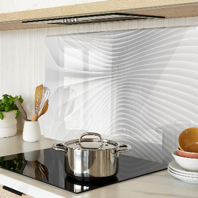 Tagliere in vetro temperato con motivo a onde e linee nei toni del grigio