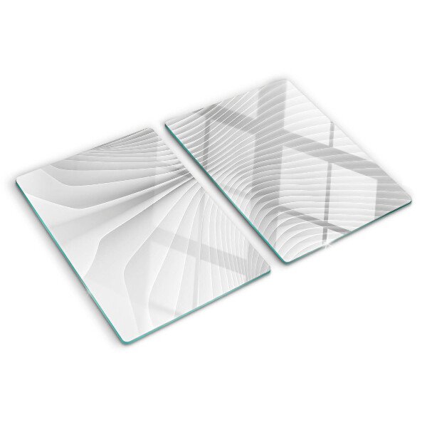 Tagliere in vetro temperato con motivo a onde e linee nei toni del grigio