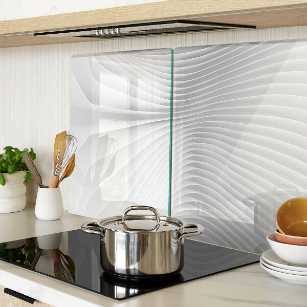 Tagliere in vetro temperato con motivo a onde e linee nei toni del grigio