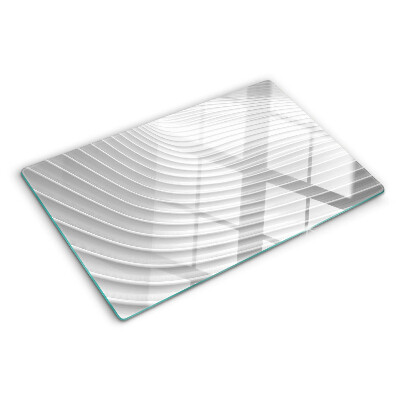 Tagliere in vetro con motivo a onde e linee nei toni del grigio