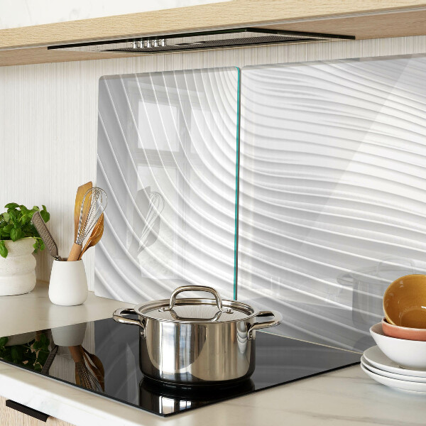 Tagliere in vetro con motivo a onde e linee nei toni del grigio