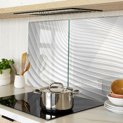 Tagliere in vetro con motivo a onde e linee nei toni del grigio