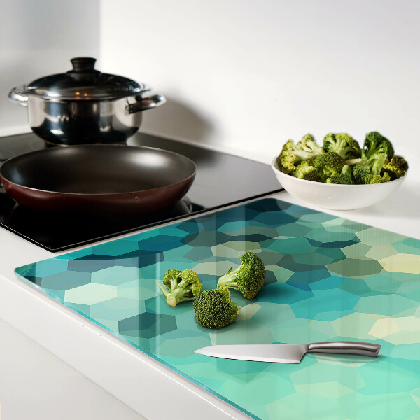 Tagliere in vetro temperato con motivo a esagoni nei toni dell'azzurro