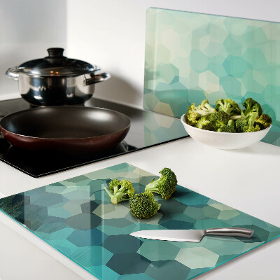 Tagliere in vetro temperato con motivo a esagoni nei toni dell'azzurro