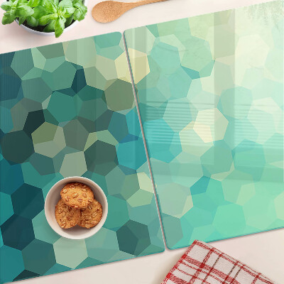 Tagliere in vetro temperato con motivo a esagoni nei toni dell'azzurro