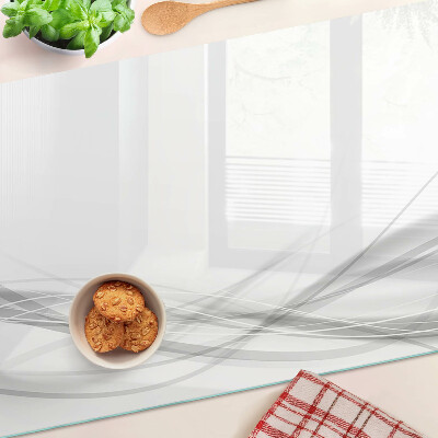 Tagliere in vetro temperato con motivo a linee e onde astratte