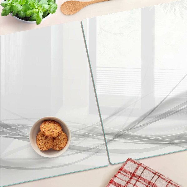 Tagliere in vetro temperato con motivo a linee e onde astratte