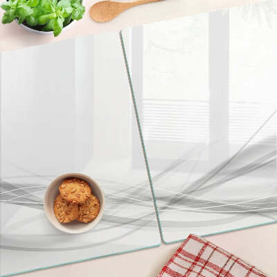 Tagliere in vetro temperato con motivo a linee e onde astratte