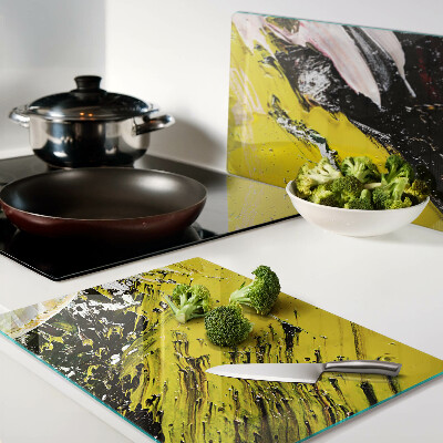 Tagliere in vetro con paesaggio astratto dai colori intensi