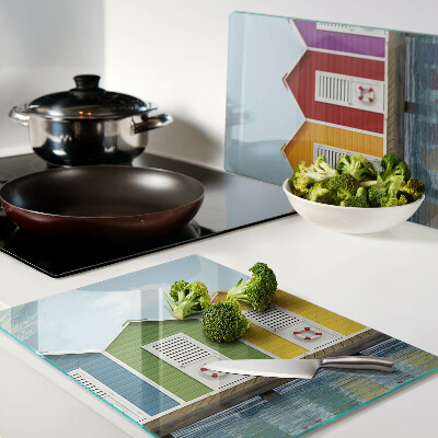 Tagliere in vetro temperato con stampa di casette colorate sul mare