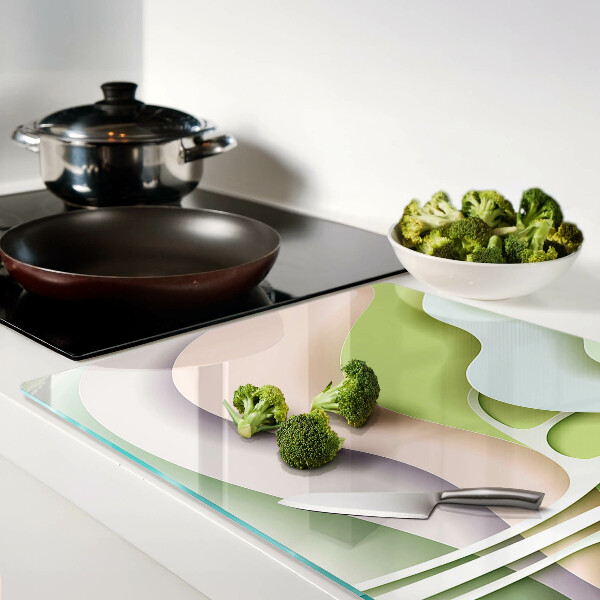 Tagliere in vetro temperato con motivo a onde astratte nei colori pastello