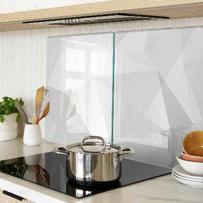 Tagliere in vetro temperato con motivi geometrici nei toni del grigio