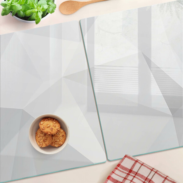 Tagliere in vetro temperato con motivi geometrici nei toni del grigio