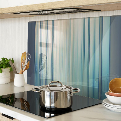 Tagliere in vetro con motivo a linee astratte nei toni del blu