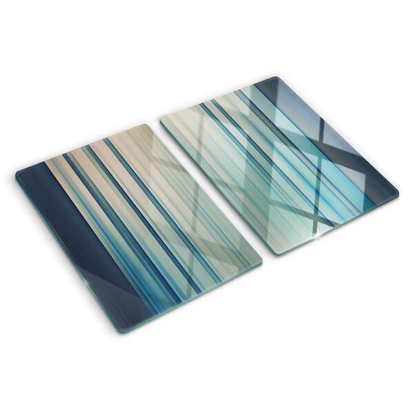 Tagliere in vetro con motivo a linee astratte nei toni del blu