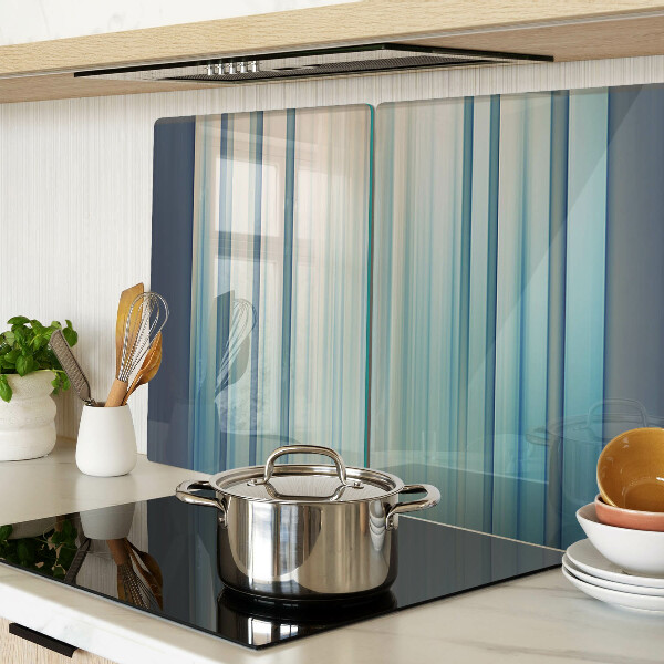 Tagliere in vetro con motivo a linee astratte nei toni del blu