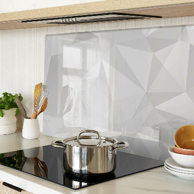 Tagliere in vetro con motivo geometrico nei toni del grigio