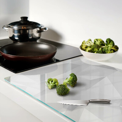 Tagliere in vetro con motivo geometrico nei toni del grigio