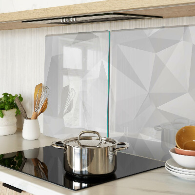 Tagliere in vetro con motivo geometrico nei toni del grigio