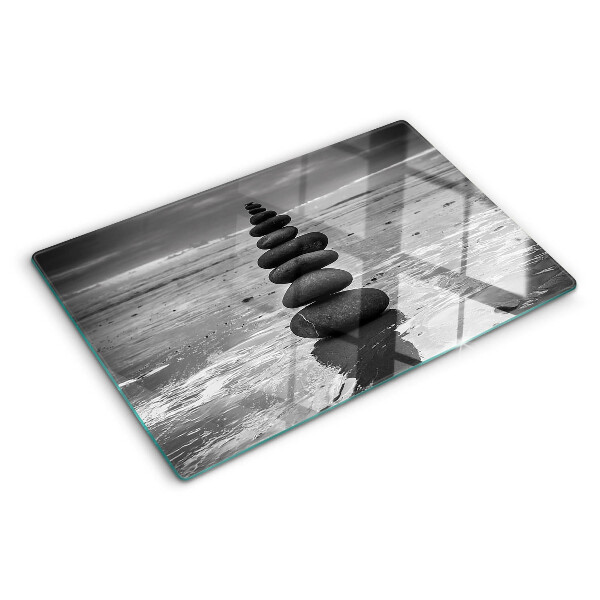 Tagliere in vetro temperato con motivo di pietre sulla spiaggia in bianco e nero