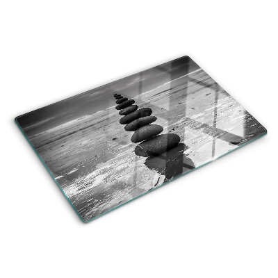 Tagliere in vetro temperato con motivo di pietre sulla spiaggia in bianco e nero