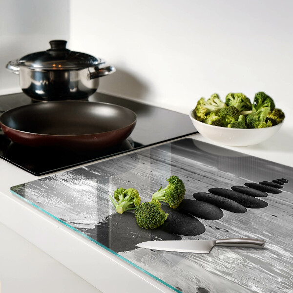 Tagliere in vetro temperato con motivo di pietre sulla spiaggia in bianco e nero