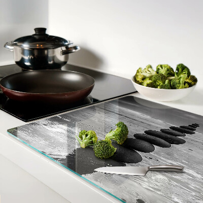 Tagliere in vetro temperato Pietre sulla spiaggia in bianco e nero