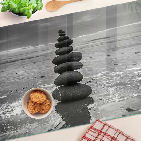 Tagliere in vetro temperato con motivo di pietre sulla spiaggia in bianco e nero