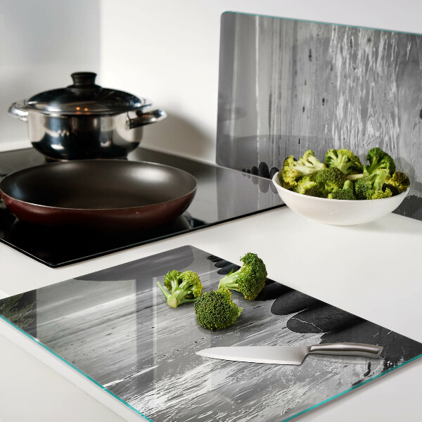 Tagliere in vetro temperato con motivo di pietre sulla spiaggia in bianco e nero