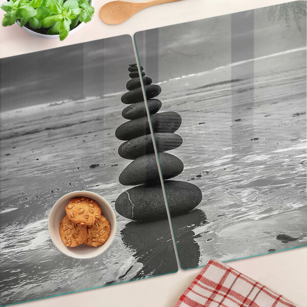 Tagliere in vetro temperato con motivo di pietre sulla spiaggia in bianco e nero