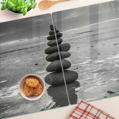 Tagliere in vetro temperato con motivo di pietre sulla spiaggia in bianco e nero