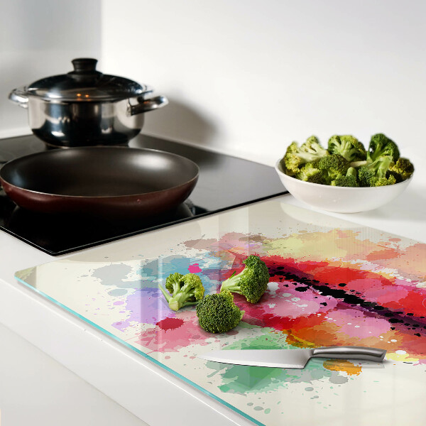 Tagliere in vetro temperato con bordo decorato con macchie colorate