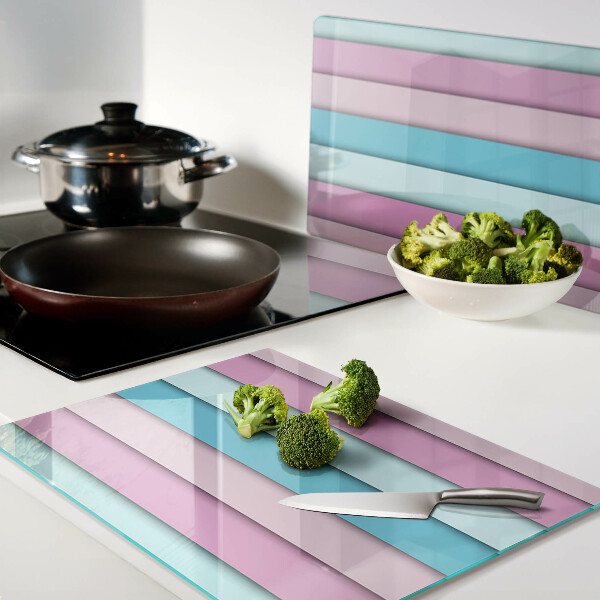 Tagliere in vetro temperato con motivo geometrico nei toni pastello