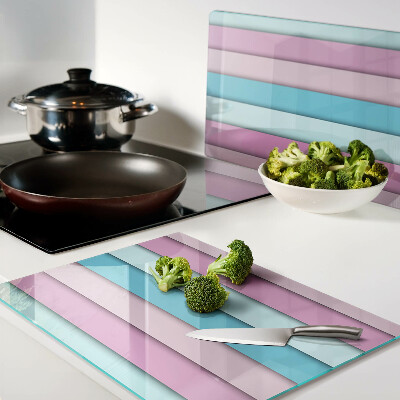 Tagliere in vetro temperato con motivo geometrico nei toni pastello