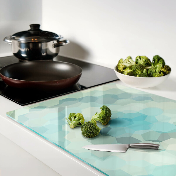 Tagliere in vetro con motivo a forme geometriche nei toni del blu