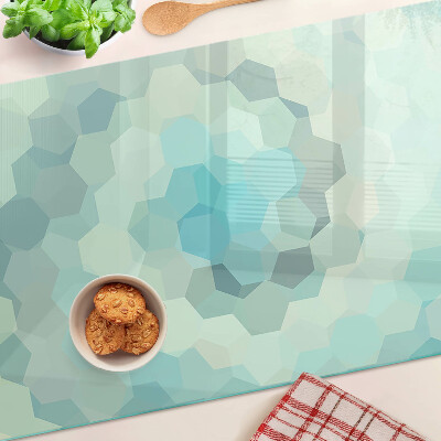 Tagliere in vetro con motivo a forme geometriche nei toni del blu