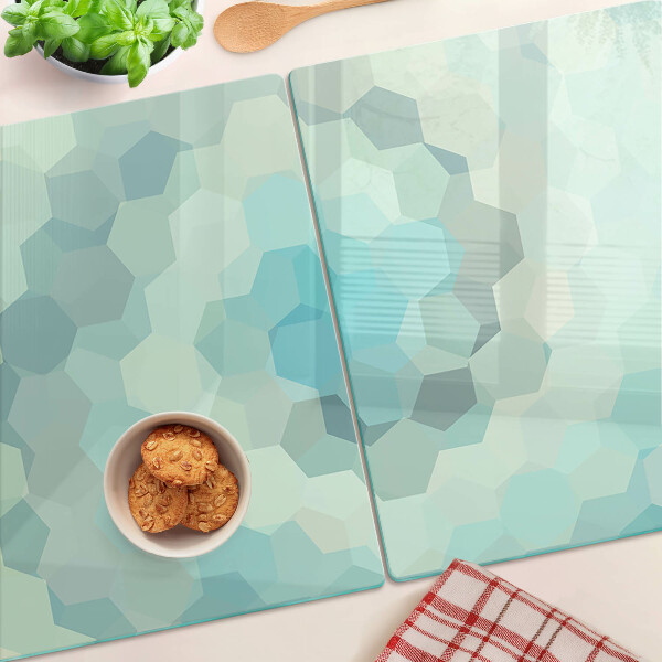 Tagliere in vetro con motivo a forme geometriche nei toni del blu