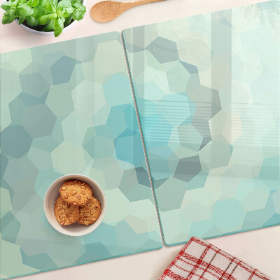 Tagliere in vetro con motivo a forme geometriche nei toni del blu