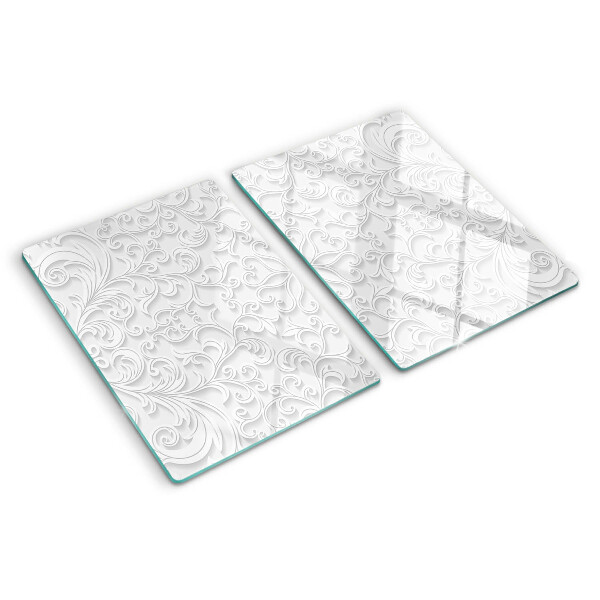 Tagliere in vetro temperato con motivo floreale e dettagli ondulati
