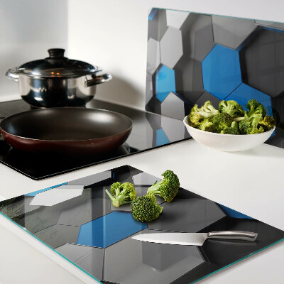 Tagliere in vetro temperato con motivo esagonale nei toni del blu e del grigio