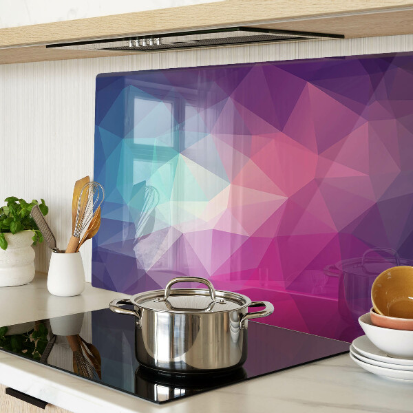 Tagliere in vetro con motivo geometrico nei toni del rosa e del blu