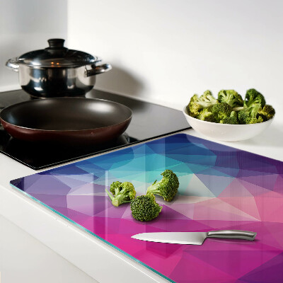 Tagliere in vetro con motivo geometrico nei toni del rosa e del blu