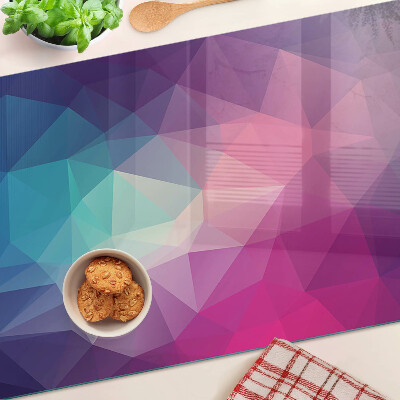 Tagliere in vetro con motivo geometrico nei toni del rosa e del blu