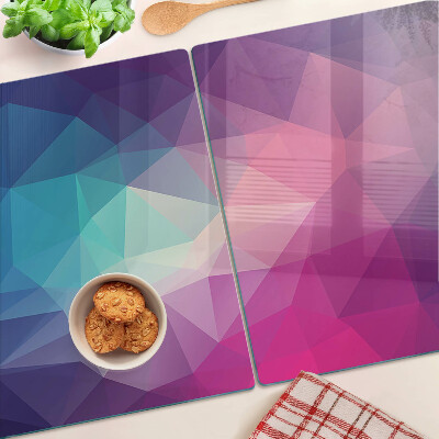 Tagliere in vetro con motivo geometrico nei toni del rosa e del blu