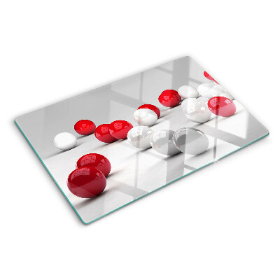 Tagliere in vetro temperato con motivo a sfere rosse e bianche